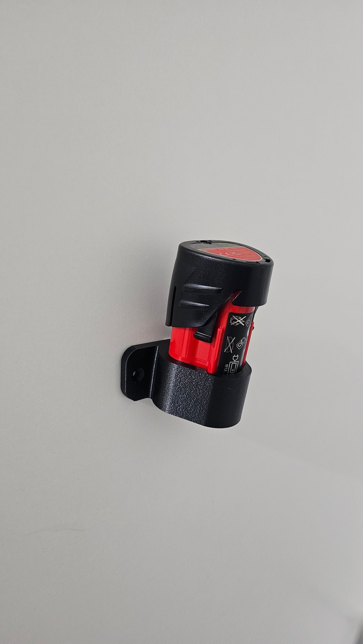 Milwaukee M12 akkuteline yhdelle akulle
